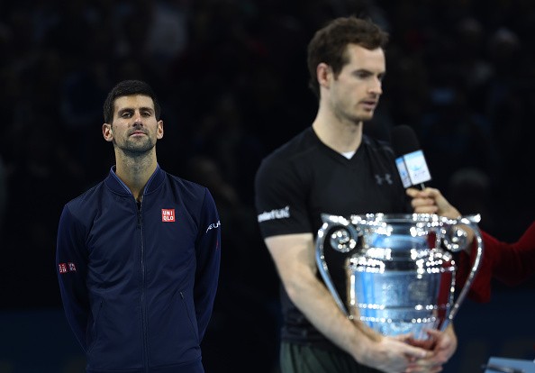 LONDON, ENGLAND - NOVEMBER 20: Novak Djokovic of Serbia looks on as champion Andy Murray of Great Britain is interviewed following the Singles Final at the O2 Arena on November 20, 2016 in London, England. 