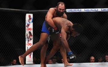 Johny Hendricks attempts to take down Neil Magny at their bout in UFC 207 held on Dec. 30, 2016.