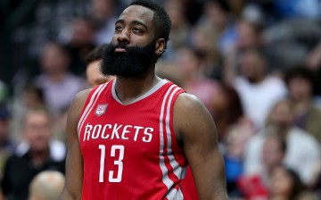 James Harden of the Houston Rockets reacts against the Dallas Mavericks in the first half at American Airlines Center on December 27, 2016 in Dallas, Texas. 