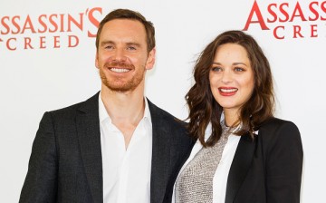 Michael Fassbender (L) and Marion Cotillard (R) attend the 