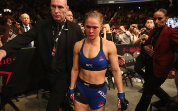 Ronda Rousey gets escorted away by security following her knockout loss to Amanda Nunes last Dec. 30, 2016 at UFC 207.