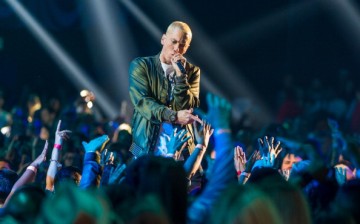 Recording artists Eminem performs onstage at the 2014 MTV Movie Awards at Nokia Theatre L.A. Live on April 13, 2014 in Los Angeles, California. 