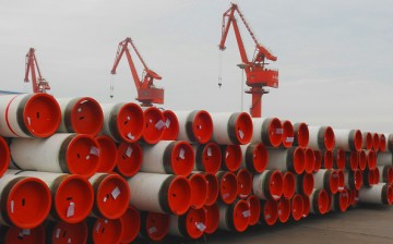 Steel pipes for shipment and export are piled up at Lianyungang Port in Lianyungang, Jiangsu Province.