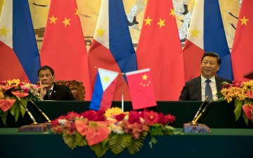 Philippine President Rodrigo Duterte and Chinese President Xi Jinping attend a signing ceremony on Oct. 20, 2016, in Beijing, China. 