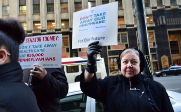 Constituents speak-out and rally supporting the Affordable Care Act, organized by MoveOn.org outside Senator Pat Toomey's office on December 20, 2016 in Philadelphia, Pennsylvania.   