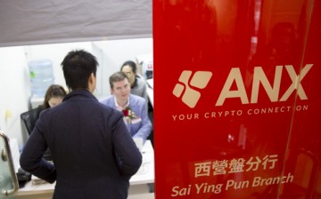 A customer buys bitcoins at a retail store in Hong Kong.