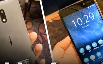 A front and back features of Nokia 6 is being showcased while it rests on a palm.