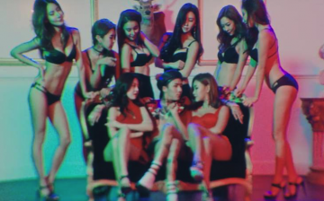 Ravi surrounded by lingerie-clad women in the controversial scene from the MV of his recent release, 
