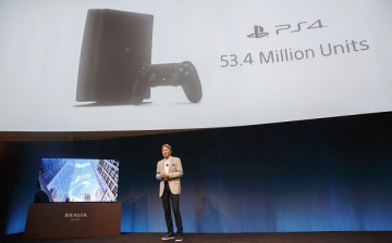 Kazuo Hirai, president and chief executive officer of Sony Corp., stands next to a Sony Sony XBR-A1E Bravia OLED 4K HDR TV while speaking about the PlayStation 4 (PS4) game console during the company's press event at the 2017 Consumer Electronics Show (CE