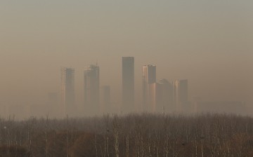 Buildings at central business district are shrouded in heavy smog on Dec. 31, 2016, in Beijing, China. 