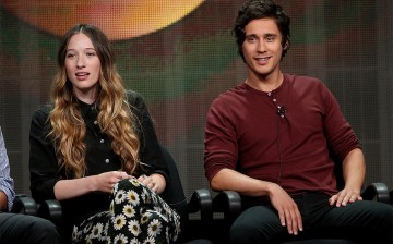 Actors Sophie Lowe (L) and Peter Gadiot speak onstage during the 'Once Upon a Time in Wonderland' panel discussion at the Television Critics Association Summer Press Tour on Aug. 4, 2013.