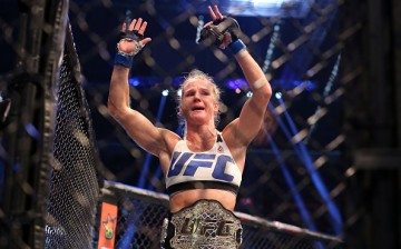 Holly Holm of the United States celebrates victory over Ronda Rousey of the United States in their UFC women's bantamweight championship bout during the UFC 193 event at Etihad Stadium on November 15, 2015 in Melbourne, Australia.