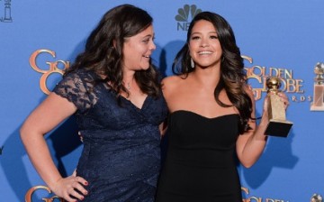Actress Gina Rodriguez (R), winner of Best Actress in a TV Series, Musical or Comedy for 'Jane the Virgin,' and sister Ivelisse Rodriguez pose in the press room during the 72nd Annual Golden Globe Awards at The Beverly Hilton Hotel on January 11, 2015 in 