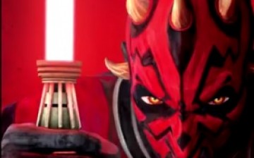 The Darth Maul wields his popular double-bladed lightsaber in this 