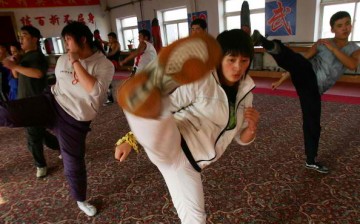 A martial-arts studio trains female bodyguards in Changchun.