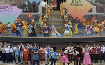 Dancers perform on the stage during opening ceremony at the Shanghai Disney Resort on June 16, 2016 in Shanghai, China.