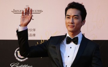 Actor Song Seung Heon arrives for the red carpet of the 17th Shanghai International Film Festival at Shanghai Grand Theatre on June 14, 2014 in Shanghai, China.