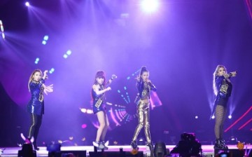 2NE1 perform on the stage during the 2015 Mnet Asian Music Awards (MAMA) at AsiaWorld-Expo on December 2, 2015 in Hong Kong, China.
