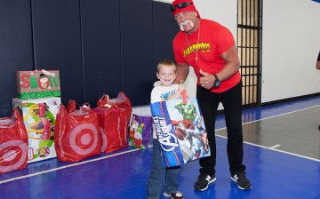 Hulk Hogan poses with a kid during his visit to the Hope Children's Home last Nov, 30, 2015.