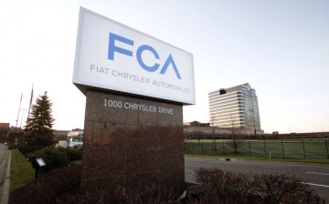 The Fiat Chrysler Automobiles (FCA) Group sign is shown at the Chrysler Group headquarters May 6, 2014 in Auburn Hills, Michigan.