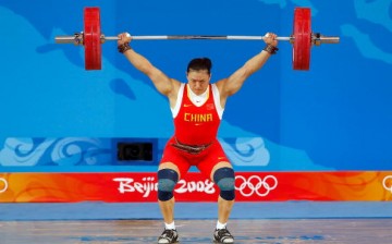Cao Lei competes in the women's 75kg weightlifting event at the Beijing University of Aeronautics & Astronautics Gymnasium on Day 7 of the Beijing 2008 Olympics on Aug. 15, 2008 in Beijing, China. 