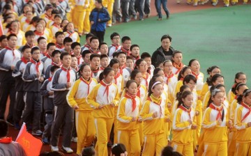 Over 1,000 students of Meiling Middle School run on their playground in the morning of Nov. 26, 2014 in Yangzhou, Jiangsu Province of China. 