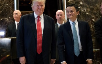 President-elect Donald Trump and Jack Ma, chairman of Alibaba Group, emerge from the elevators to speak to reporters following their meeting at Trump Tower, Jan. 9, 2017 in New York City.