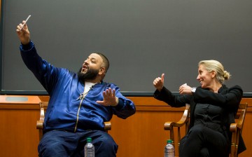 DJ Khaled posing for a photo with Harvard Business School Professor of Business Administration Anita Elberse during the Get Schooled Snapchat College Tour.