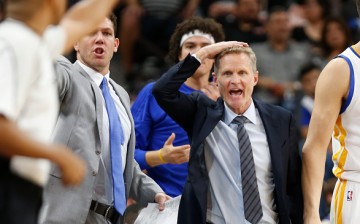  Steve Kerr, head coach of the Golden State Warriors, argues a call with official during game against the San Antonio Spurs at AT&T Center on April 10, 2016 in San Antonio, Texas. The Warriors won 92-86, tying the all-time record for wins in a season with