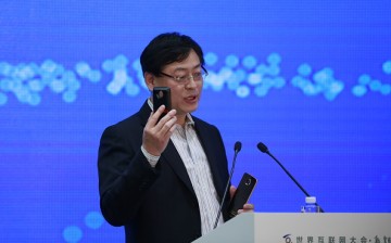 Yang Yuanqing, chairman and CEO of Lenovo Group Ltd, speaks on 'Man meets machine: Smart Internet opens a world of possibilities
