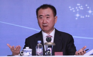 Wang Jianlin attends a press conference for the ppening af a Wanda movie park.
