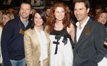 (L-R) Sean Hayes, Megan Mullally, Debra Messing, and Eric McCormack from the Cast of 'Will and Grace' walk on the floor of the New York Stock Exchange on May 18, 2006 in New York City.   
