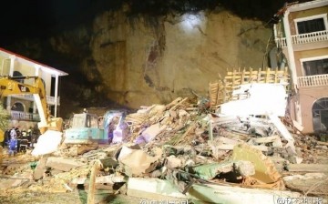 A hotel in Hubei crumbled after being hit by a landslide.