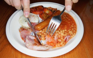 In this photo illustration an all English fry up breakfast is eaten