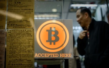 A man walks out of a bitcoin exchange store in Hong Kong.