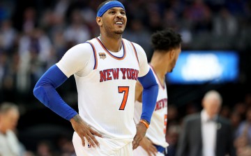 Carmelo Anthony of the New York Knicks reacts against the Dallas Mavericks in the second half at American Airlines Center on January 25, 2017 in Dallas, Texas.