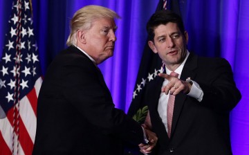 U.S. President Donald Trump (L) shakes hands with Speaker of the House Rep. Paul Ryan (R-WI) (R) during a luncheon at the Congress of Tomorrow Republican Member Retreat.