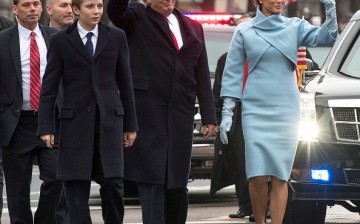 President Donald Trump and first lady Melania Trump, along with their son Barron, walk in their inaugural parade on Jan. 20, 2017 in Washington, DC. Donald Trump was sworn-in as the 45th President of the United States.   