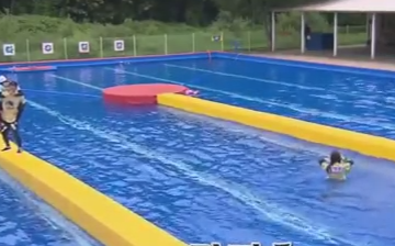 South Korean variety show 'Running Man' episode 304 is held in a swimming pool.   