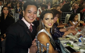 Yibada News editor Conan Altatis poses with Miss Peru Valeria Piazza during a Miss Universe 2016 event in Baguio City, Philippines.