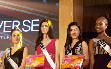 Miss Israel Yam Kaspers Anshel, Miss Italy Sophia Sergio, Miss Japan Sari Nakazawa and Miss Kenya Mary Esther Were pose onstage during a Miss Universe 2016 event in Baguio City, Philippines, on Jan. 18, 2017.