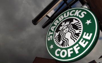 The Starbucks logo hangs outside one of the company's cafes in Northwich