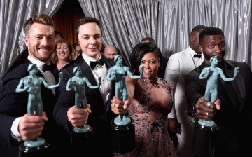 LOS ANGELES, CA - JANUARY 29: (L-R) Actors Glenn Powell, Jim Parsons, Taraji P. Henson, and Aldis Hodge, co-recipients of the Outstanding Cast in a Motion Picture award for 'Hidden Figures', pose backstage during The 23rd Annual Screen Actors Guild Awards