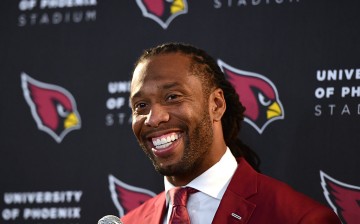 Larry Fitzgerald of the Arizona Cardinals smiles during a post game interview after a 44-6 win over the Los Angeles Rams at Los Angeles Memorial Coliseum.