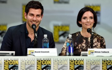 David Giuntoli (L) and Bitsie Tulloch attend the 'Grimm' season four panel during Comic-Con International 2014 at the San Diego Convention Center on July 26, 2014. 