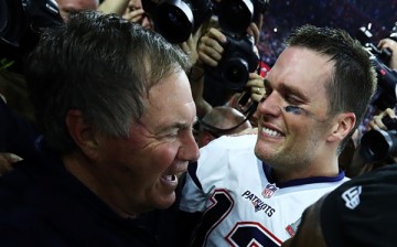 Tom Brady #12 and head coach Bill Belichick of the New England Patriots