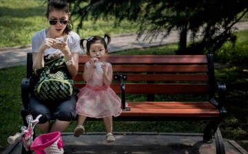 Chinese society still expects child rearing to be the sole responsibility of mothers.
