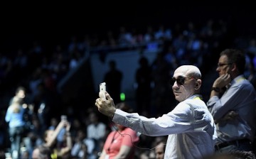 An attendee uses an Apple Inc. iPhone, not the iPhone 8, before the start of an event in San Francisco, California, U.S., on Wednesday, Sept. 7, 2016.