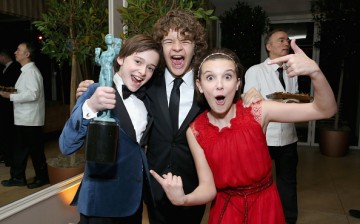 (L-R) Actors Noah Schnapp, Gaten Matarazzo and Millie Bobby Brown attend The Weinstein Company & Netflix's 2017 SAG After Party in partnership with Absolut Elyx at Sunset Tower Hotel on January 29, 2017 in West Hollywood, California. 