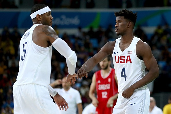 RIO DE JANEIRO, BRAZIL - AUGUST 12: Carmelo Anthony #15 and Jimmy Butler #4 of United States celebrate while taking on Serbia in the Men's Preliminary Round Group A match on Day 7 of the Rio 2016 Olympic Games at Carioca Arena 1 on August 12, 2016 in Rio de Janeiro, Brazil. 
